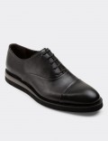 LACE-UP HIGH SHOES IN BLACK GLOSSY CALFSKIN