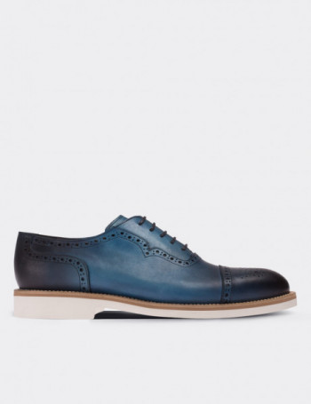blue leather lace up shoes
