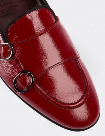 red patent leather loafers