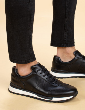 OVERSIZED SNEAKERS IN WHITE TEXTURED CALFSKIN BLACK HEEL BLACK LACES